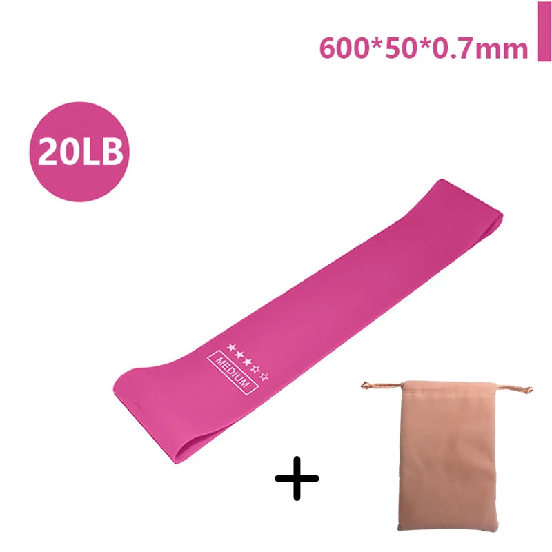 Fitnessstudio mit elastischen Bändern, Fitness-Trainingsgeräte, Yoga-Widerstandsbänder, Übungsvolumen, Fitnessstudio-Training, Bodybuilding, Pilates